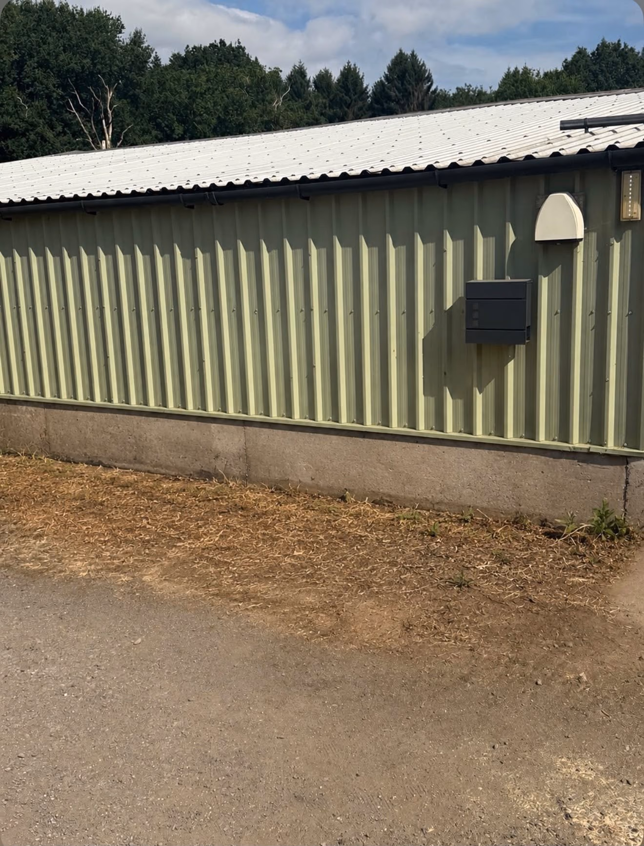 After: mattress, cylinders and mixed waste cleared from a commercial yard