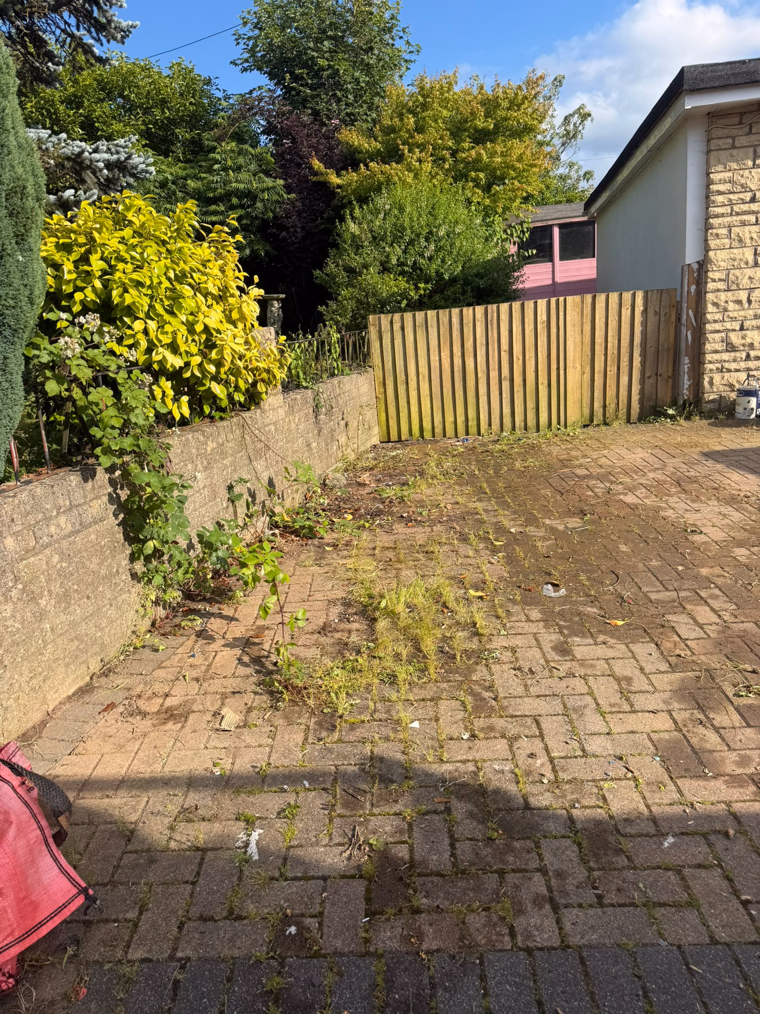 After: mixed rubbish and fencing cleared from a driveway